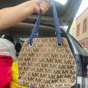 Brown and blue Michael Kors bag